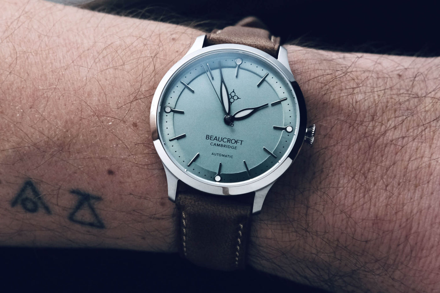 The Beaucroft Seeker Mint colour mechanical watch on a male wrist