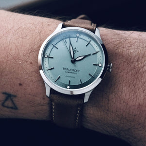 The Beaucroft Seeker Mint colour mechanical watch on a male wrist